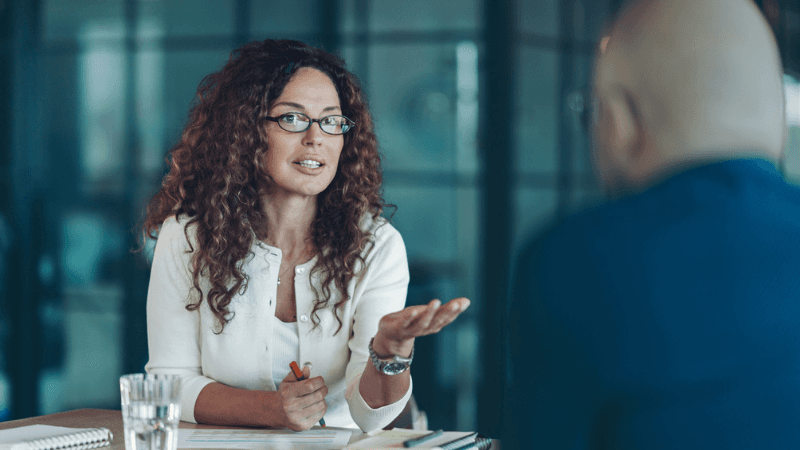 Lawyer Discussing A Job Offer And Salary Negotiation During A Professional Meeting.